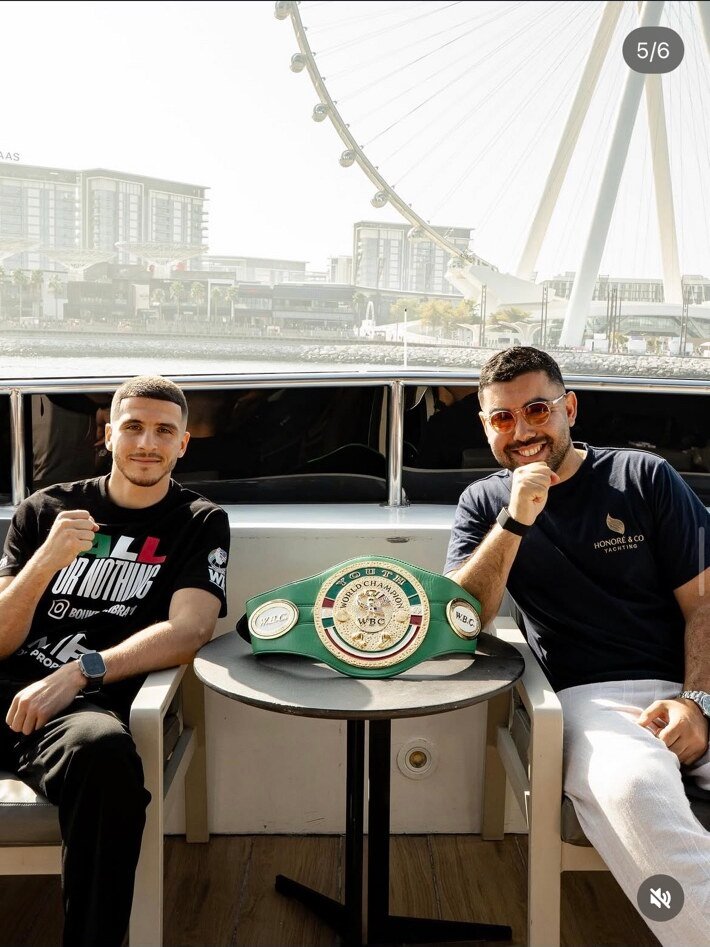 Ibrahim Boukedim and the WBC belt aboard the yacht